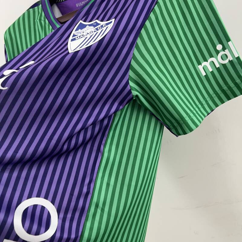 camiseta málaga 23 24 lateral