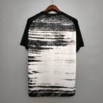 Camiseta calentamiento Real Madrid 2020/21 diseño dorsal