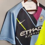 Camiseta calentamiento Manchester City 2019/20 diseño lateral