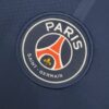 primera camiseta psg azul insignia