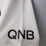 camiseta psg blanca y rosa qnb