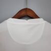 camiseta psg blanca y rosa cuello