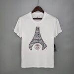 camiseta blanca Messi torre eiffel