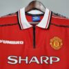 camiseta manchester united 1998-99 pecho