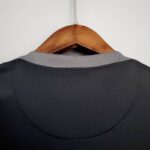 tercera camiseta psg negro gris cuello