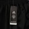Pantalón de Chándal Manchester United 2122 etiqueta