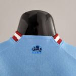 Camiseta Manchester City Primera Equipación 2022-2023 Versión jugador cuello posterior