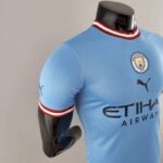 Camiseta Manchester City Primera Equipación 2022-2023 Versión jugador lateral