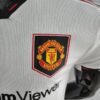 ESCUDO Camiseta Manchester United Segunda Equipación 2022-2023 Versión Jugador