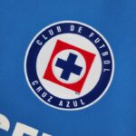 ESCUDO Camiseta de Cruz Azul Primera Equipación 2223 Versión Aficionado