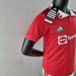 PECHO LATERAL Mini Conjunto Manchester United Primera Equipación 2022-2023