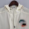 CUELLO Cortavientos Nike Beige Azul
