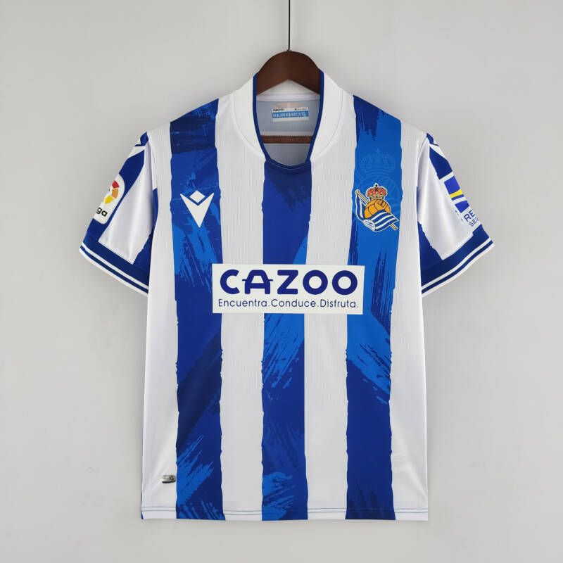 Camiseta Real Sociedad primera equipación 2022 - 2023 versión fan frontal Camiseta Real Sociedad primera equipación 2022 - 2023 versión fan frontal