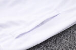 Bolsillo de la chaqueta blanca del Real Madrid 2022-2023