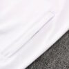 Bolsillo de la chaqueta del chándal blanco de la Juventud 2022-2023