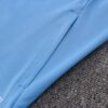 Bolsillo de la chaqueta del chándal celeste del Manchester United 2022-2023
