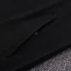 Bolsillo de la chaqueta del chándal negro del Manchester United 2022-2023