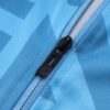 Cremallera de la chaqueta del chándal celeste del Manchester City 2022-2023