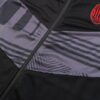 Cremallera de la chaqueta del chándal negro de la A.C Milan 2022-2023.