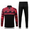 Dorso del conjunto de chándal negro de la A.C Milan 2022-2023