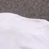 Dorso del cuello de la chaqueta del chándal blanco del Paris Saint-Germain 2022-2023