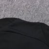 Dorso del cuello de la chaqueta del chándal negro del Chelsea 2022-2023