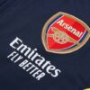 Escudo chándal azul zafiro del Arsenal 2022-2023
