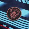 Escudo del chándal azul oscuro del Manchester City 2022-2023