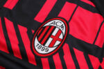 Escudo del chándal negro de la A.C Milan 2022-2023