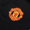 Escudo del chándal negro del Manchester United 2022-2023