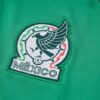 Escudo del chándal verde oscuro de México 2022-2023