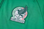 Escudo del chándal verde oscuro de México 2022-2023