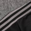 Hombro de la chaqueta del chándal negro de la Juventud 2022-2023