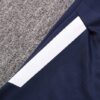 Lateral del pantalòn del chandal azul del Olympique de Marsella 2022-2023