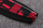 Manga de la chaqueta del chándal negro de la A.C Milan 2022-2023