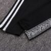 Tobillo del pantalón del chándal negro del Manchester United 2022-2023
