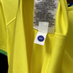 camiseta de brasil campeon qatar 2022 boton