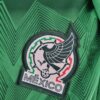 Body Mexíco primera equipación 2022-2023 escudo