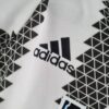 Body de la Juventus primera equipación 2022-2023 logo
