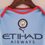 Body del Manchester City primera equipación 2022-2023 Cuello