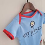 Body del Manchester City primera equipación 2022-2023 lateral