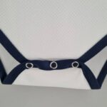 Body del Tottenham primera equipación 2022-2023 botones