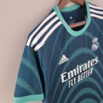 Camiseta Real Madrid clásico azul oscuro 2022-2023 lateral
