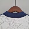 Camiseta Real Madrid drangon chino blanco 2022-2023 dorso del cuello