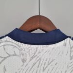 Camiseta Real Madrid drangon chino blanco 2022-2023 dorso del cuello