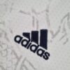 Camiseta Real Madrid drangon chino blanco 2022-2023 logo
