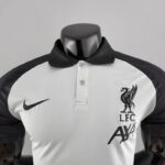 Polo Liverpool Negro y Blanco 2022-2023 cuello 2
