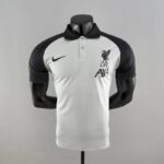 Polo Liverpool Negro y Blanco 2022-2023 frontal
