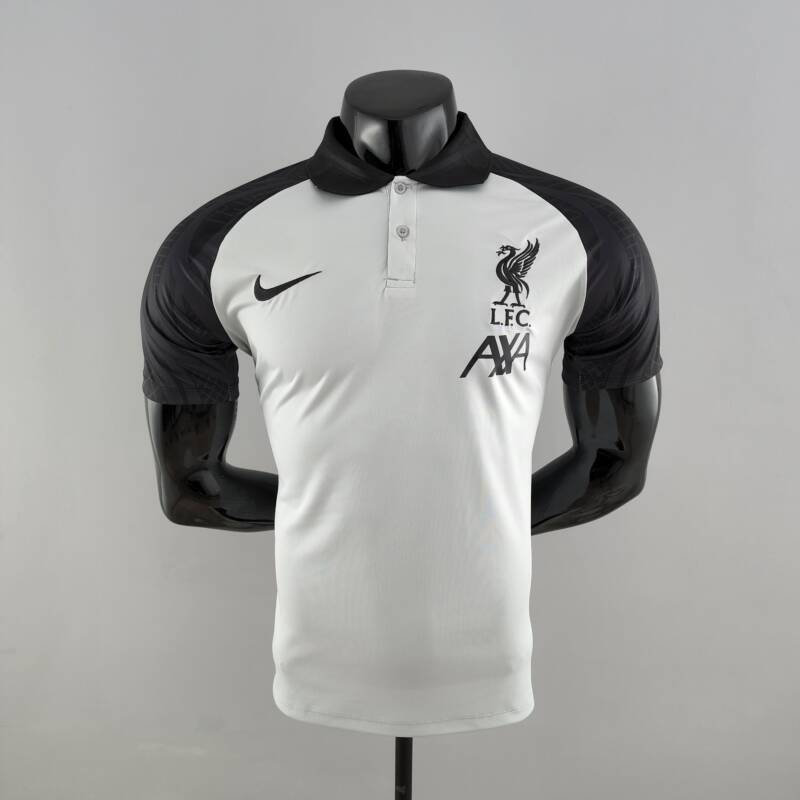 Polo Liverpool Negro y Blanco 2022-2023 frontal Polo Liverpool Negro y Blanco 2022-2023 frontal