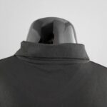 Polo Manchester City Negro 2022-2023 dorso del cuello